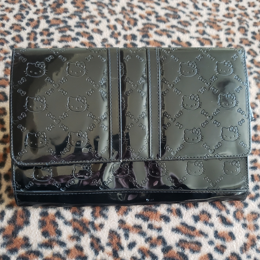 Hello Kitty x Loungefly pattern vinyl clutch bag